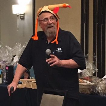 Bob Dahn wore a turkey hat during the auction.