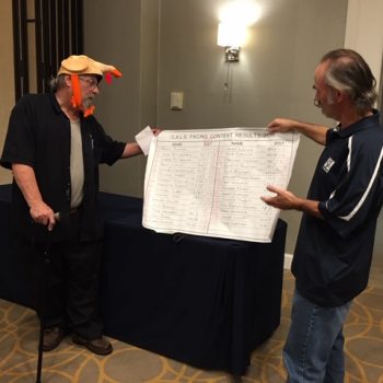 Bob Dahn holding the pacing contest results with Jim Schrager who runs the pacing contest each year. Jim received a Certificate of Appreciation this year for his contribution to CALS.